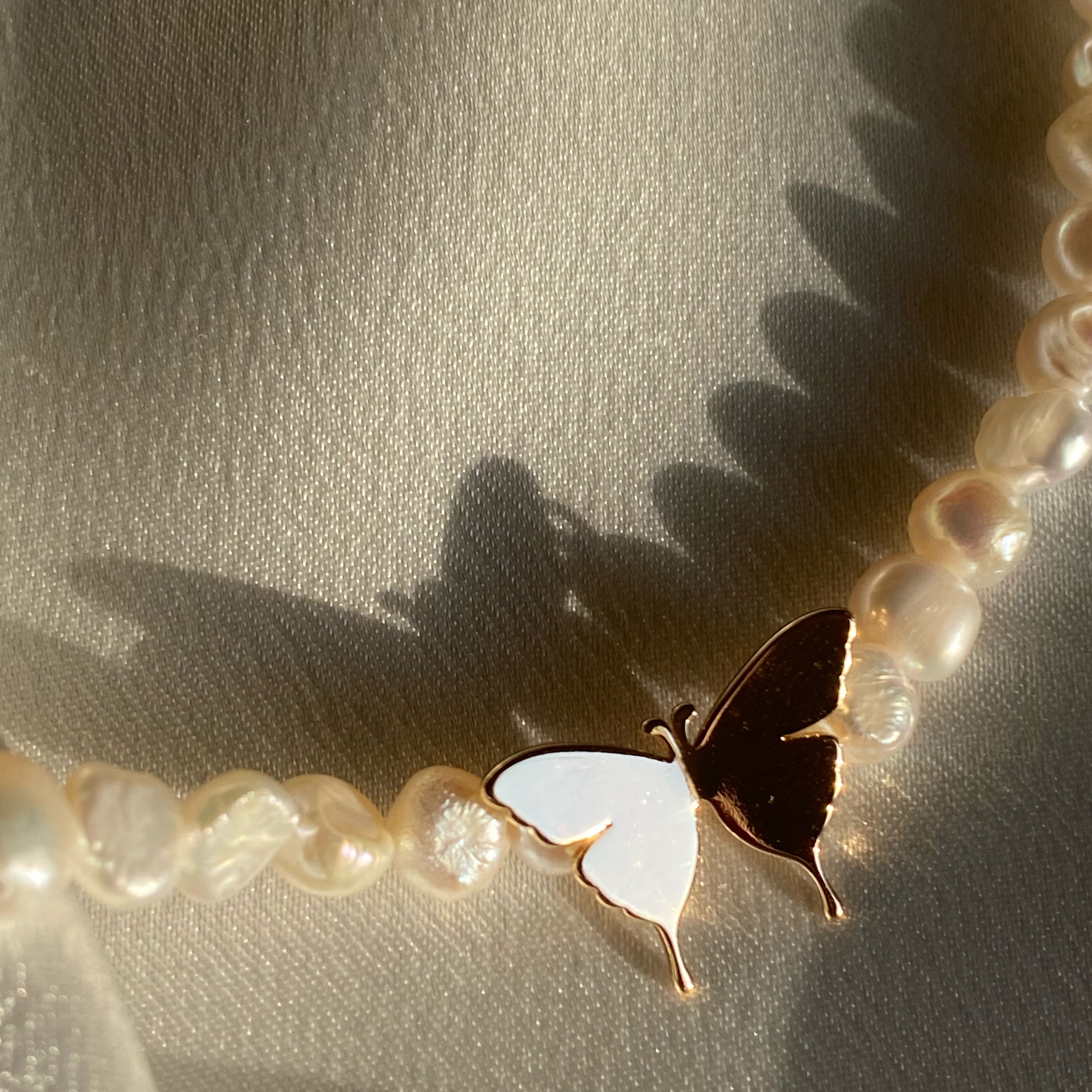 Baby Butterfly Pearl in Cage Necklace